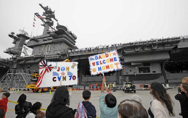 Navy ship that buried bin Laden returns to US port