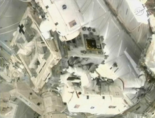 Astronauts on last spacewalk of shuttle era