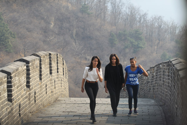 Obamas climb Great Wall after lunch of trout