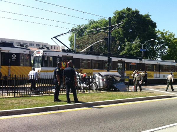 LA commuter train hits car, partially derails; 21 hurt