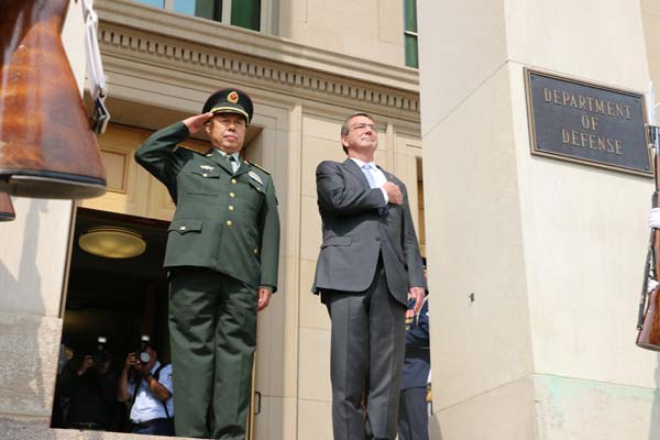 Carter greets General Fan at Pentagon