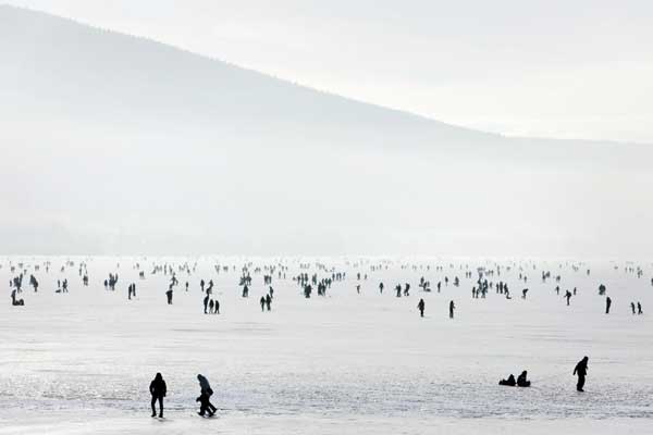 Paradise for skaters on frozen lake