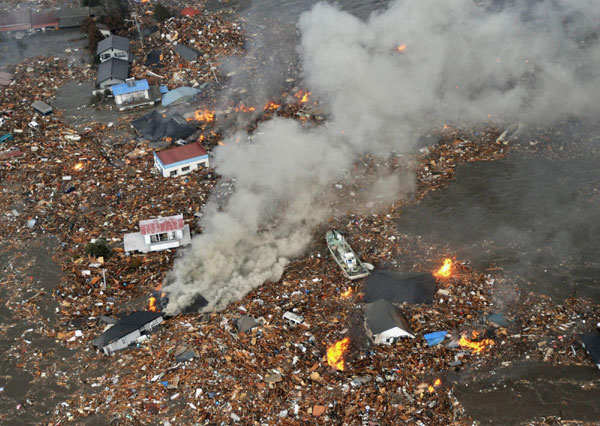 Sendai Airport flooded after tsunami