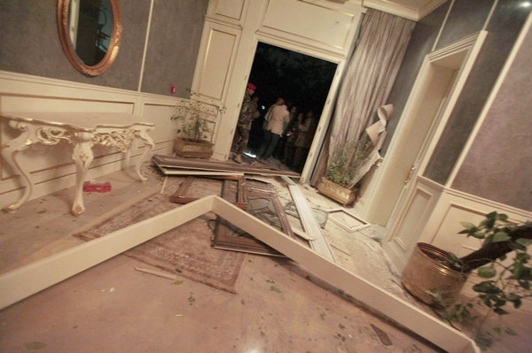 NATO airstrikes level Gadhafi's office