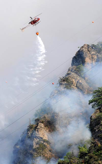 Switzerland village sees forest fire