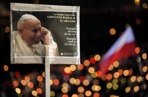 Pope beatifies John Paul before 1m faithful