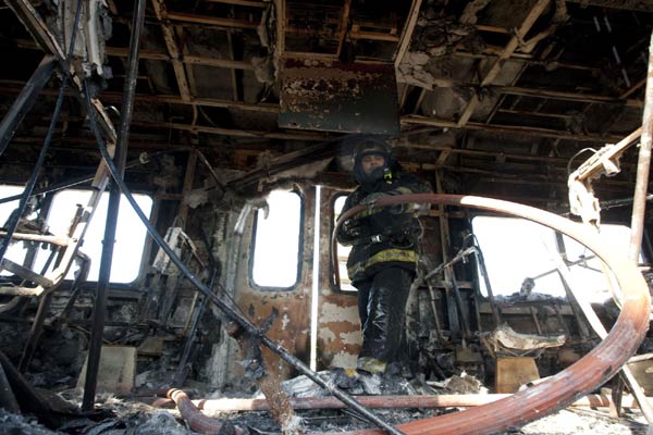 Angry passengers set delayed train on fire