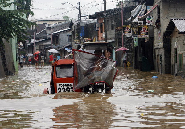 Tropical storm leaves 15 missing in Philippines