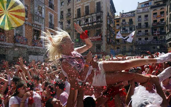 Revellers celebrate San Fermin Festival in Spain