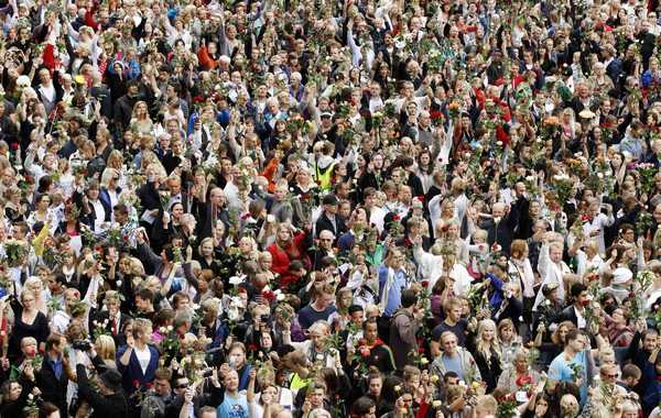 Sea of flowers marks vigil for twin attack victims