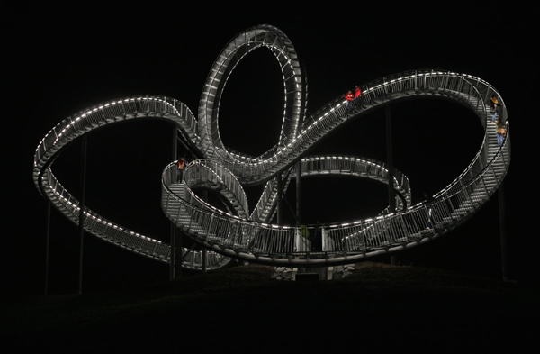 Walk on magical curved steel sculpture