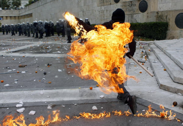 Greek police fire tear gas at protesters in Athens