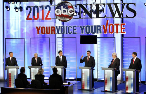 Rivals fail to take Romney down in NH debate