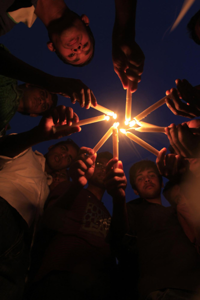 Candlelight vigil held to mark Japanese quake