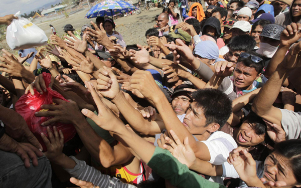 Typhoon that killed 600 threatens Philippines again