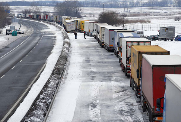 Hungary sends in tanks as cold snap grips E Europe