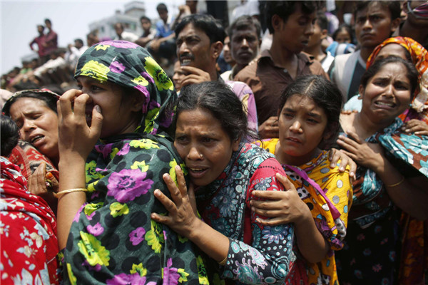 Bangladesh building collapse kills nearly 100