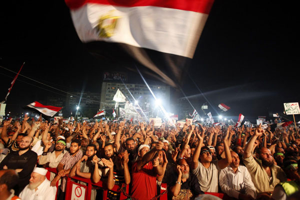 Egyptian forces kill dozens of supporters of Morsi