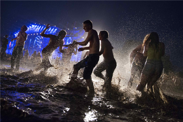 Woodstock revellers embrace music and mud