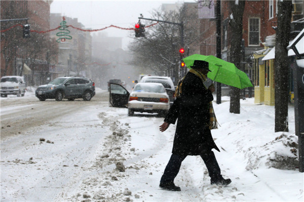 Heavy snow, dangerous cold snarl travel in NE US