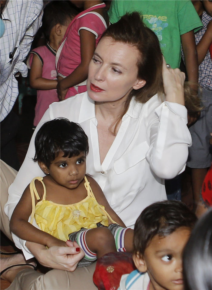 France's former First Lady undertakes charity visit to India