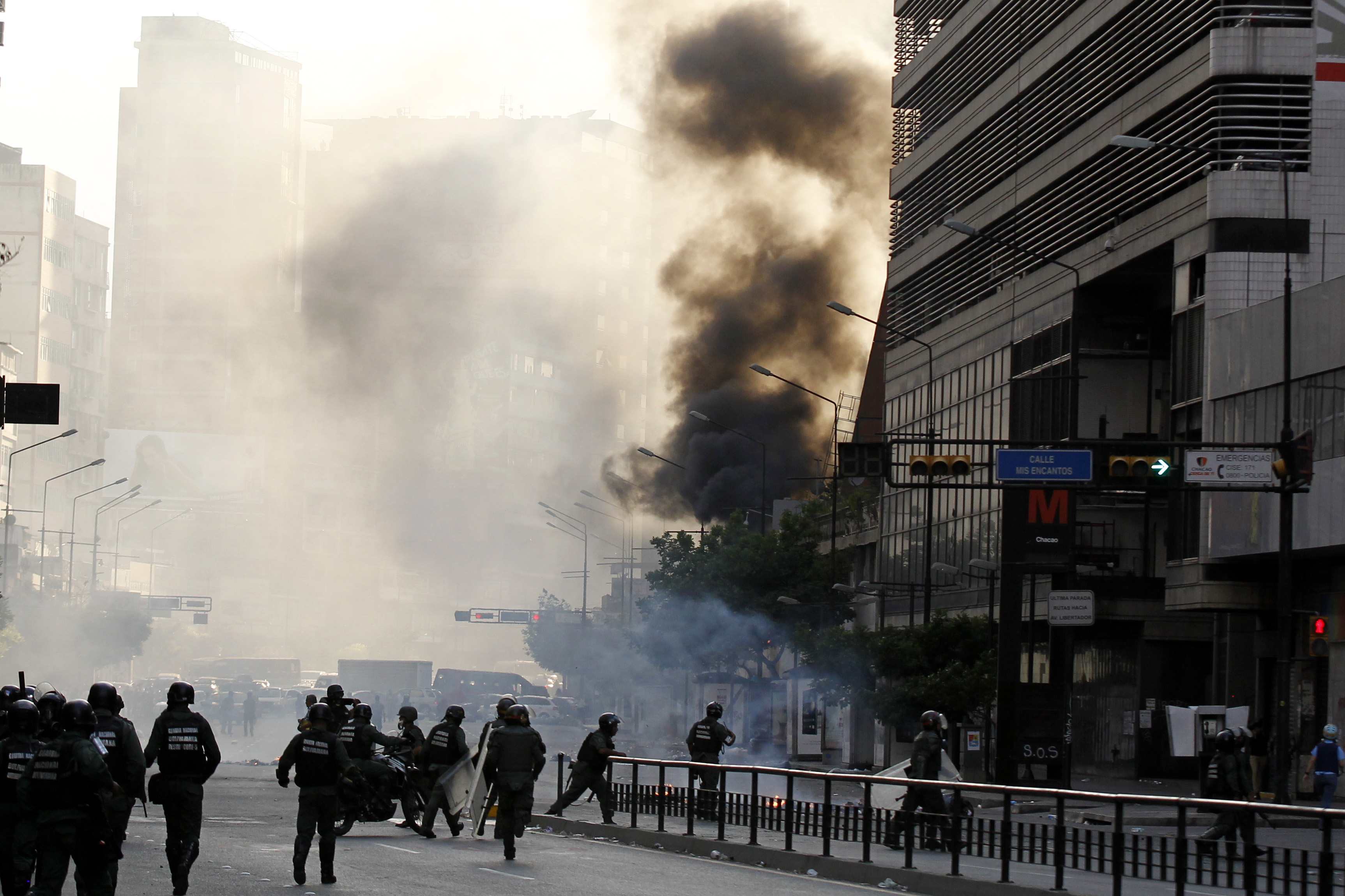 Venezuelan anti-govt protestors set on fire in rally