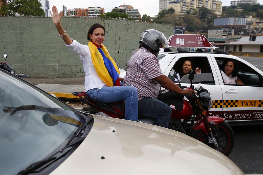 Venezuelan anti-govt protestors set on fire in rally