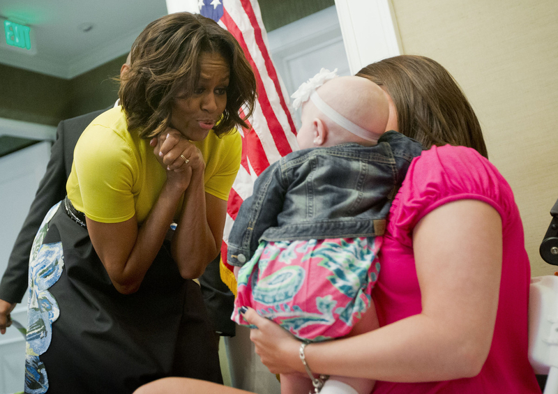 Michelle Obama plays with kids