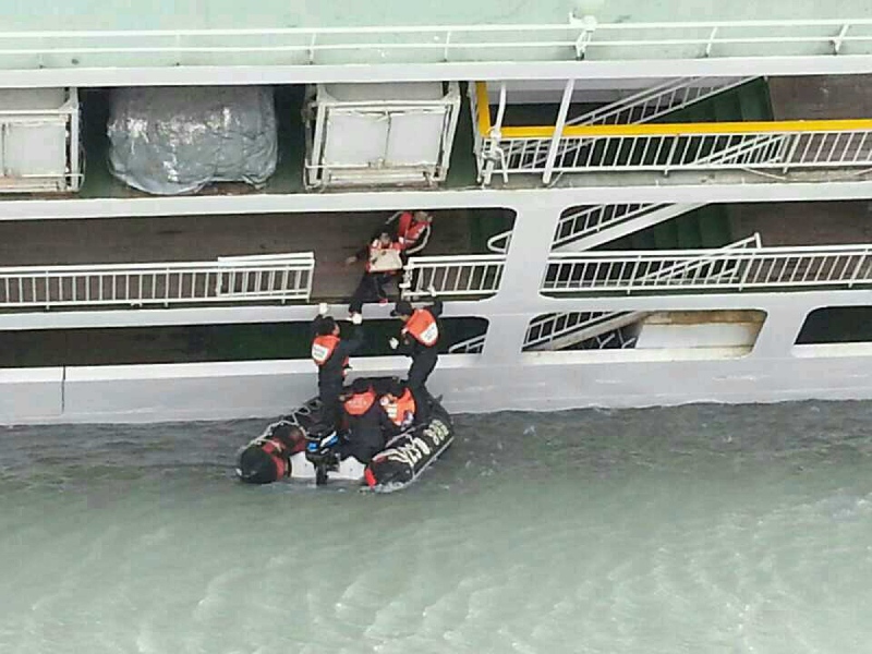 Passengers rescued by South Korean maritime policemen