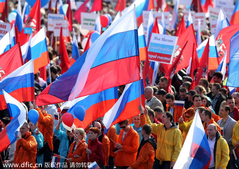 Russians parade to celebrate Labor Day