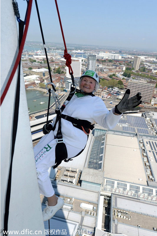 'Daring Doris' celebrates 100th birthday by abseiling