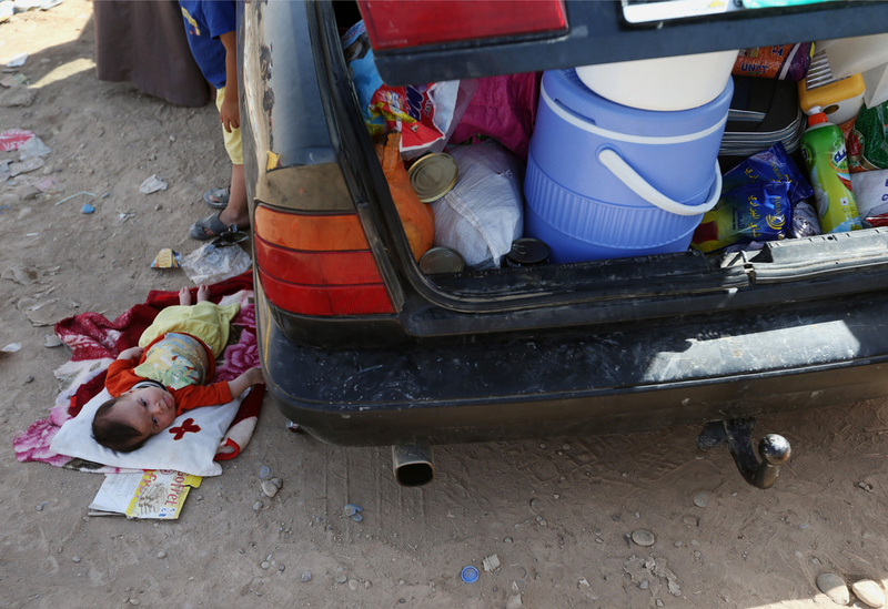 Northern Iraqis flee their home, avoiding Sunni millitans