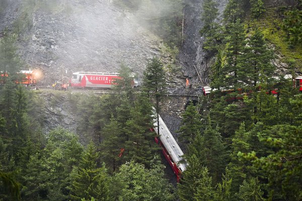 Swiss passenger train derails into ravine, 11 injured