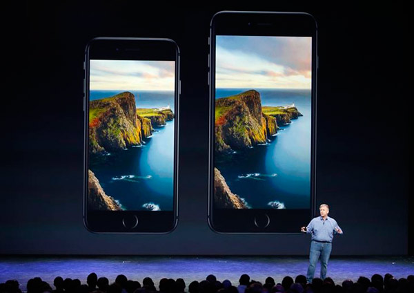 Apple unveils the Watch, larger iPhones at star-studded event