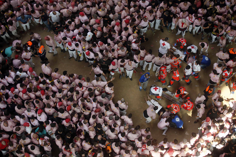 Castellers build human towers