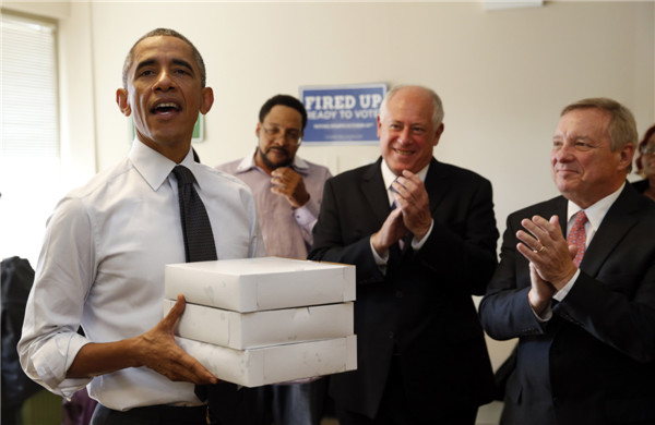 Obama votes early in Chicago, encourages others to follow