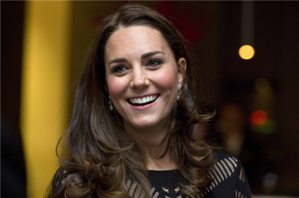 Pregnant Kate stuns in knit dress at charity gala