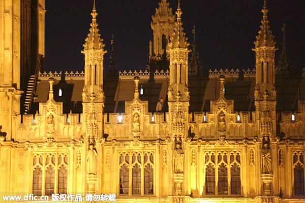 UK police detain trespasser who climbed to Parliament's roof