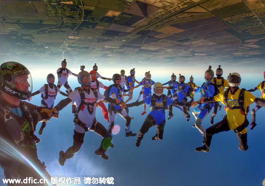 Skydivers perform breaking feat for departed friend