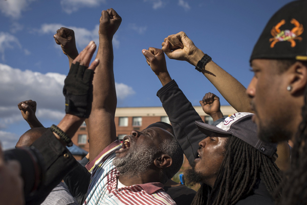 Police descend on Baltimore to enforce curfew after riots