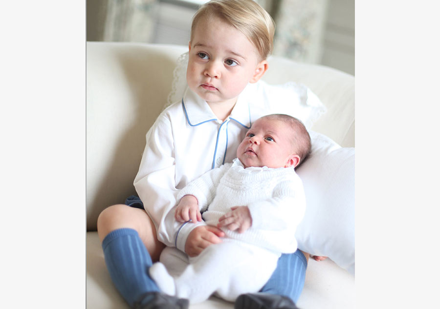 Photos show Princess Charlotte, Prince George together