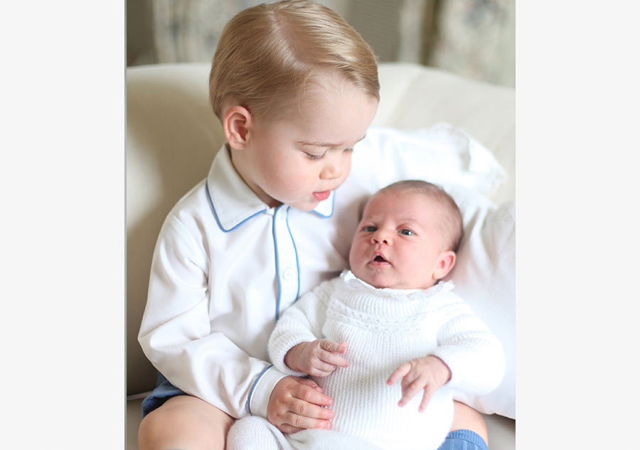 Photos show Princess Charlotte, Prince George together