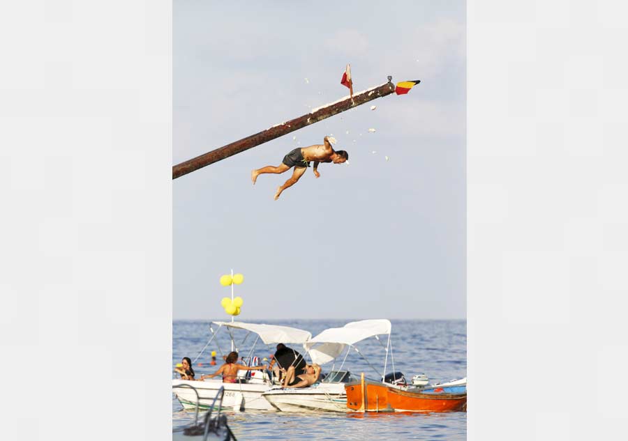 Gostra - Traditional Maltese game of running up a greasy pole