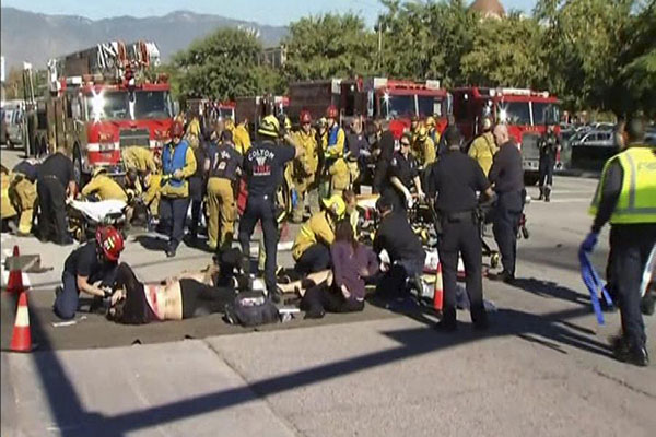 Shooting rampage at California social services agency leaves 14 dead, 14 wounded