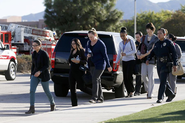 Shooting rampage at California social services agency leaves 14 dead, 14 wounded