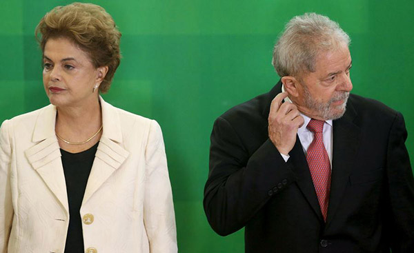 Brazil's Lula sworn in over protests as Rousseff faces impeachment