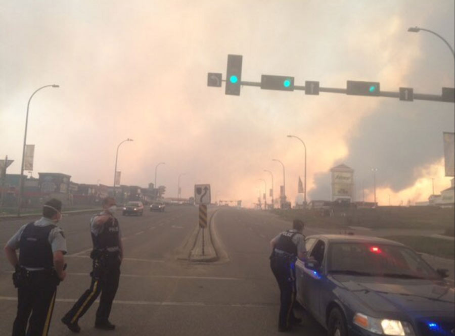 Raging wildfire spreads to more areas in west Canada