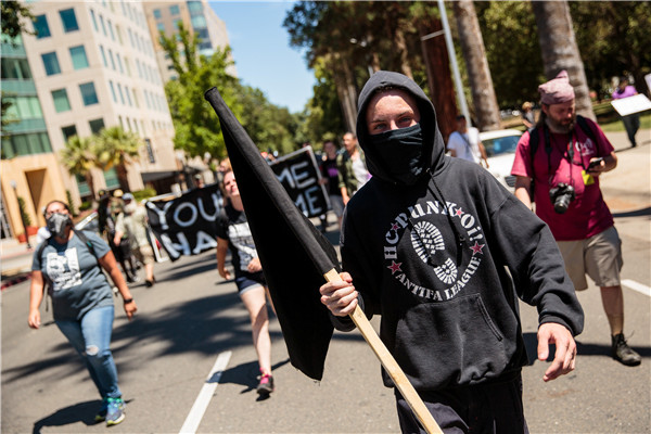 Clash at California capitol leaves at least 10 injured