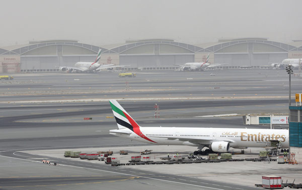 Fire guts Emirates jet after hard landing; 1 firefighter dies