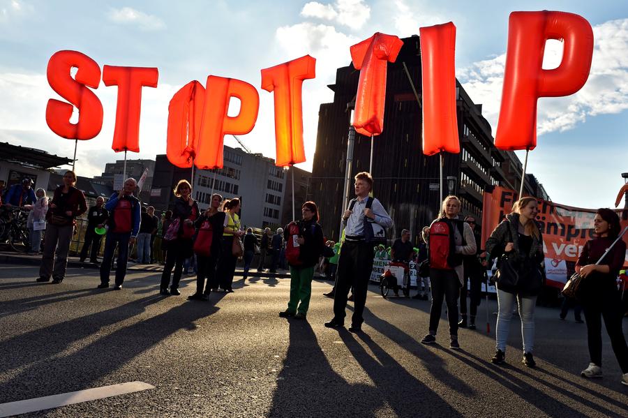 Thousands protesters march against EU trade deals with US, Canada